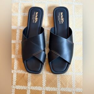 New in Box Coach and Four Black Leather Slides, 10M